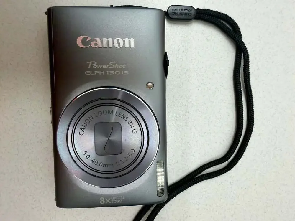 Canon PowerShot ELPH 130 IS 16.0MP Digital Camera Bundle with Case and Charger